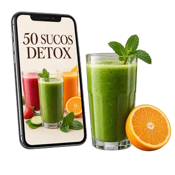 Celular mostrando o guia 50 sucos detox ao lado de um copo de suco verde